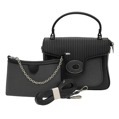 Black handbag with chain strap and shoulder strap on a white background