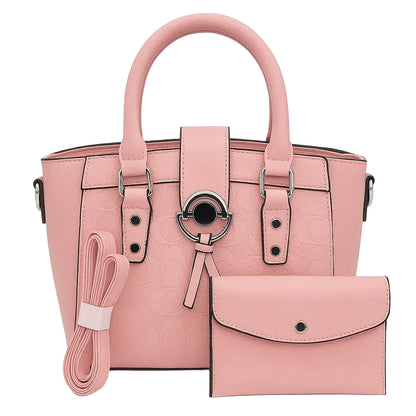Pink handbag with matching wallet and strap on a white background